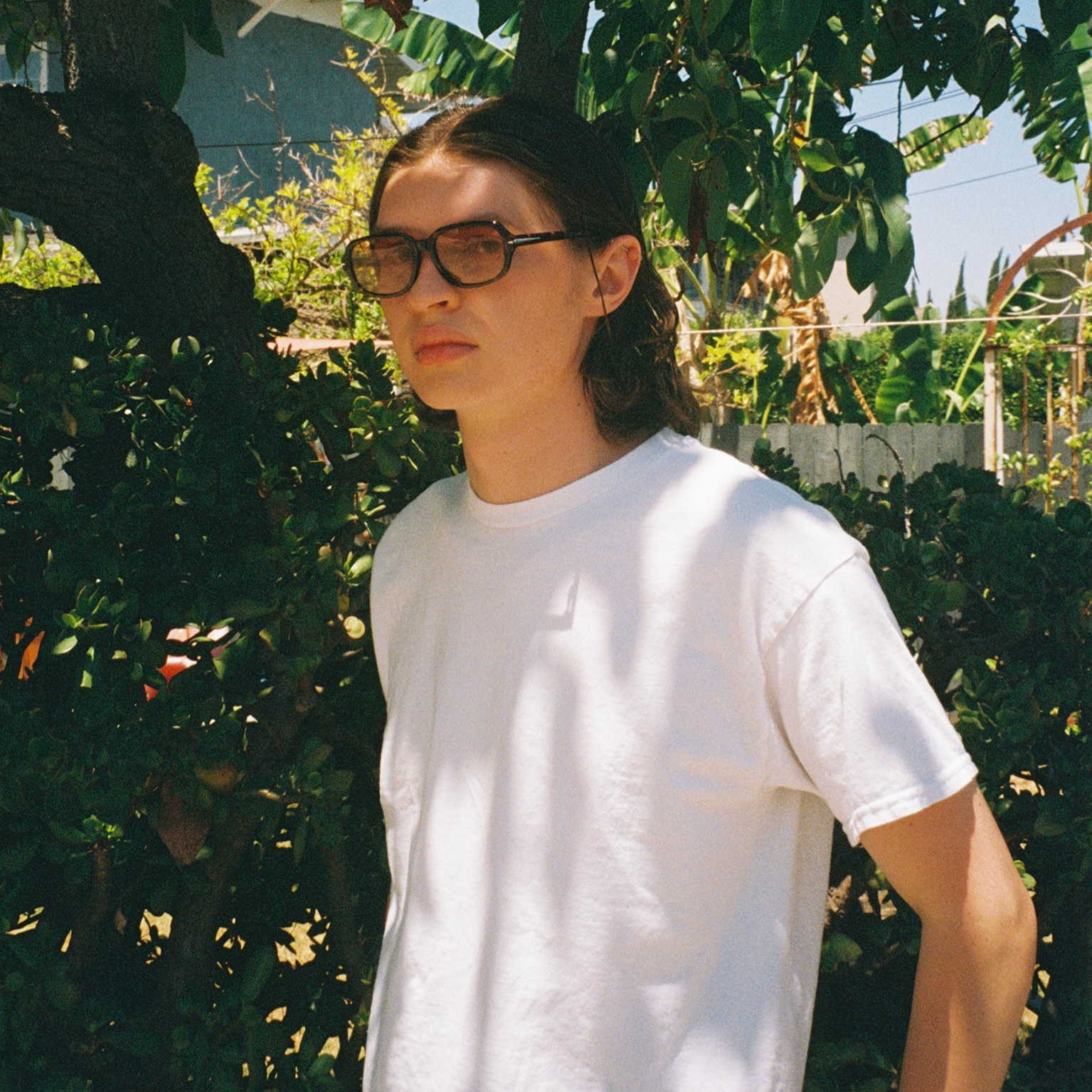 Man wearing SAD Eyewear Dusk premium square sunglasses in tortoiseshell with UV protection lenses