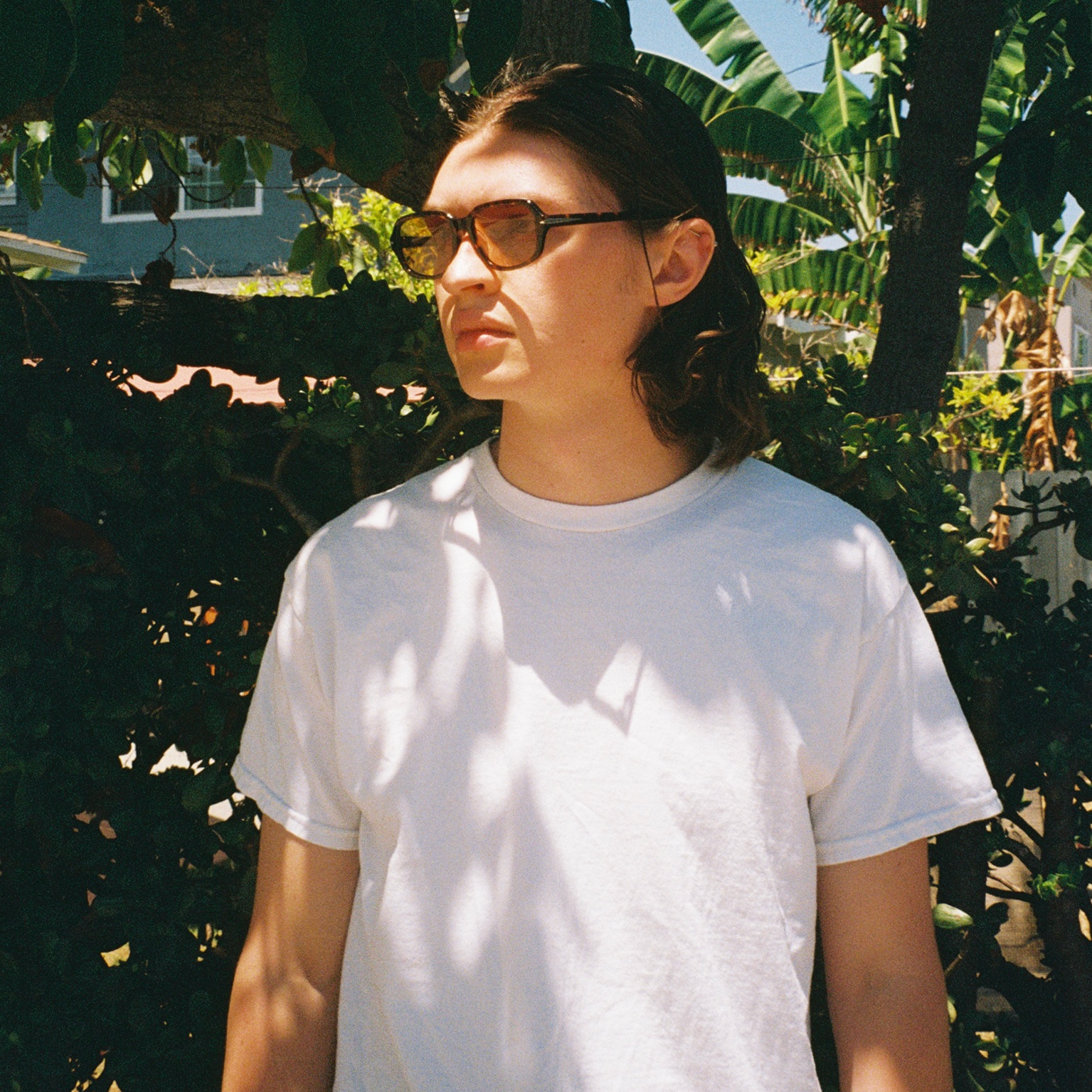 Man wearing SAD Eyewear Dusk premium square sunglasses in tortoiseshell with UV protection lenses