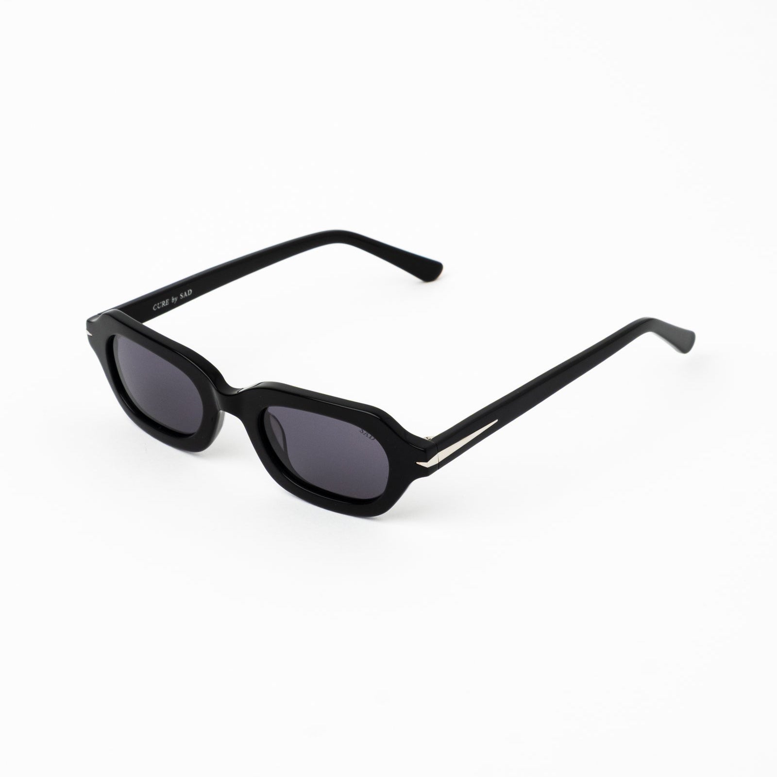 CURE--GLOSS_BLACK_POLARIZED_GREY__SAD_Ecom_1__Fin_Nichols.jpg