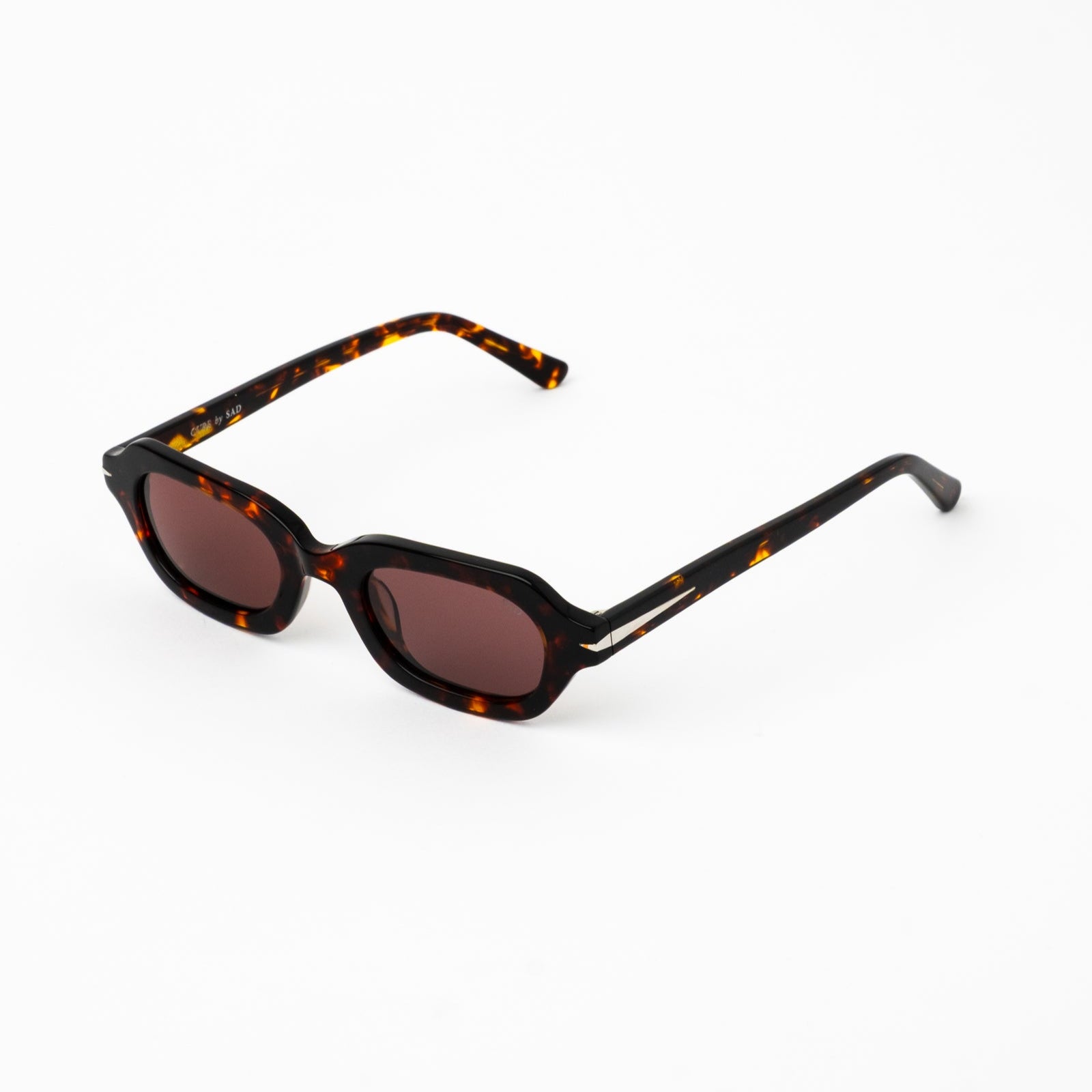 CURE--TORTOISE_POLARIZED_MAUVE__SAD_Ecom_1__Fin_Nichols.jpg