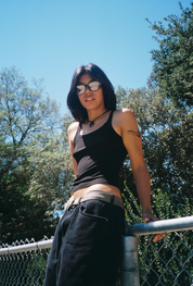 Woman wearing SAD Eyewear Dusk premium square glasses in black with clear blue light protection lenses