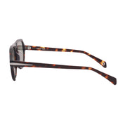 Sunglasses with tortoiseshell frame on a light gray background