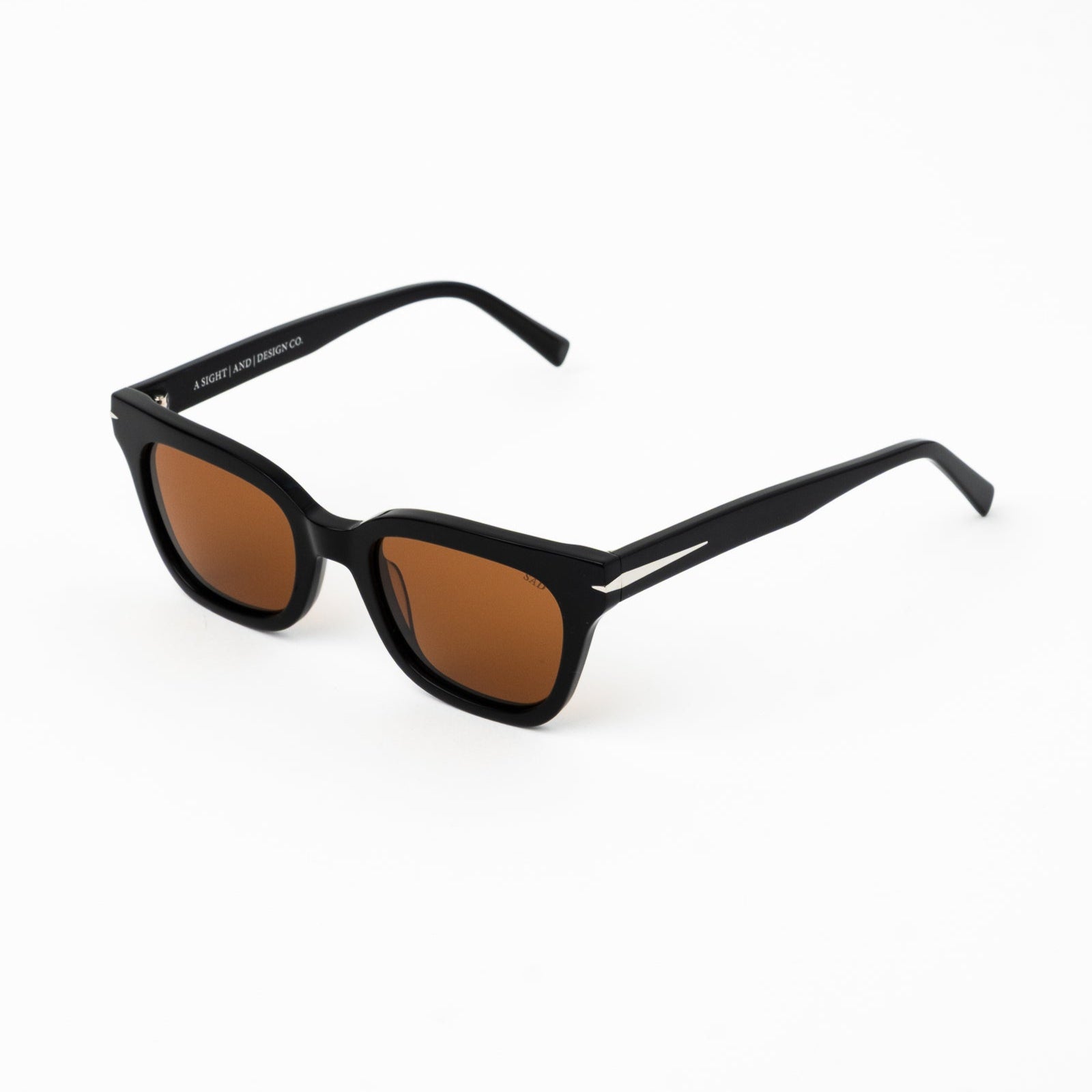 NOIR--GLOSS_BLACK_POLARIZED_BRONZE__SAD_Ecom_1__Fin_Nichols.jpg