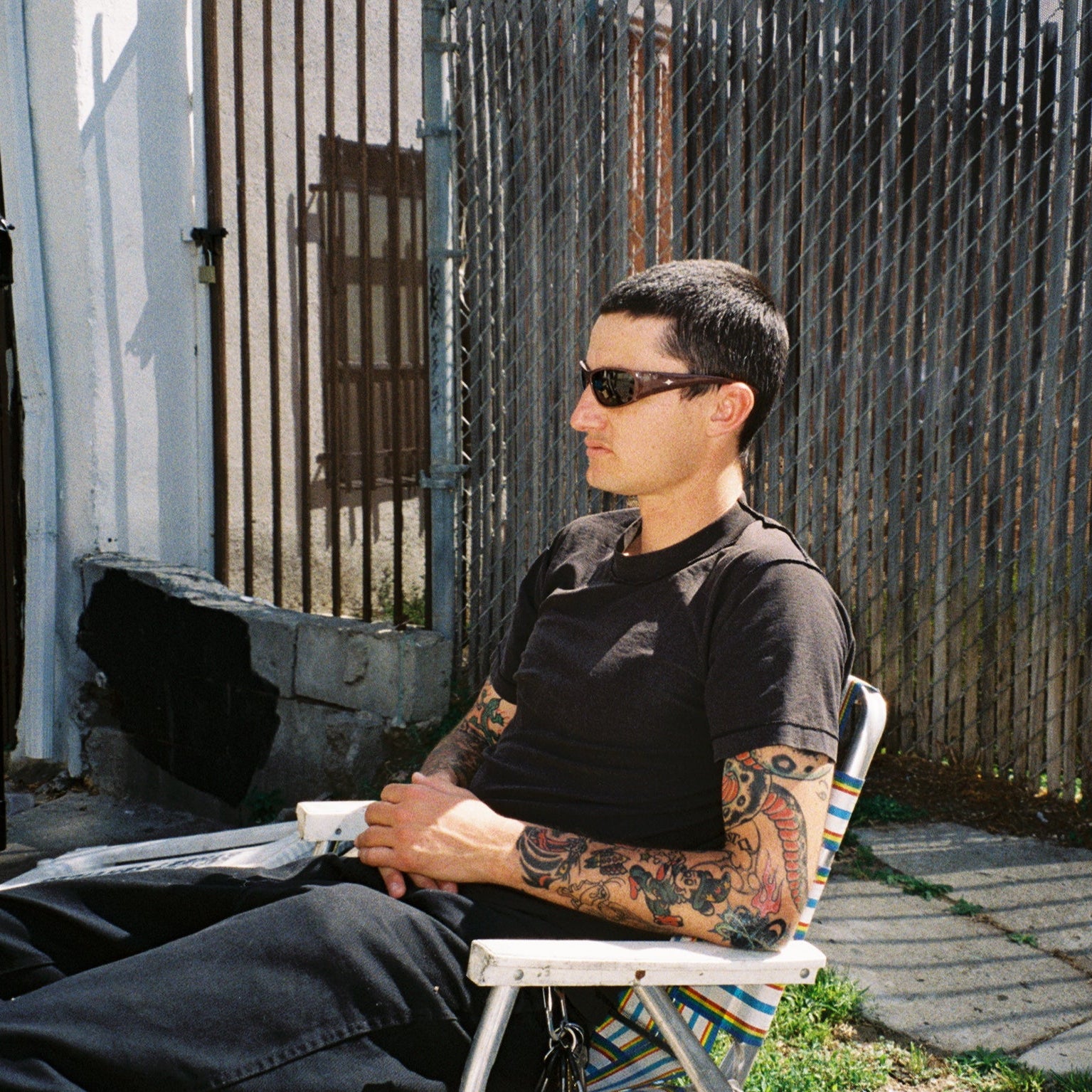 Zachary Kovacs wearing SAD Eyewear Fade wrap around sunglasses sepia with polarized grey UV protection lenses