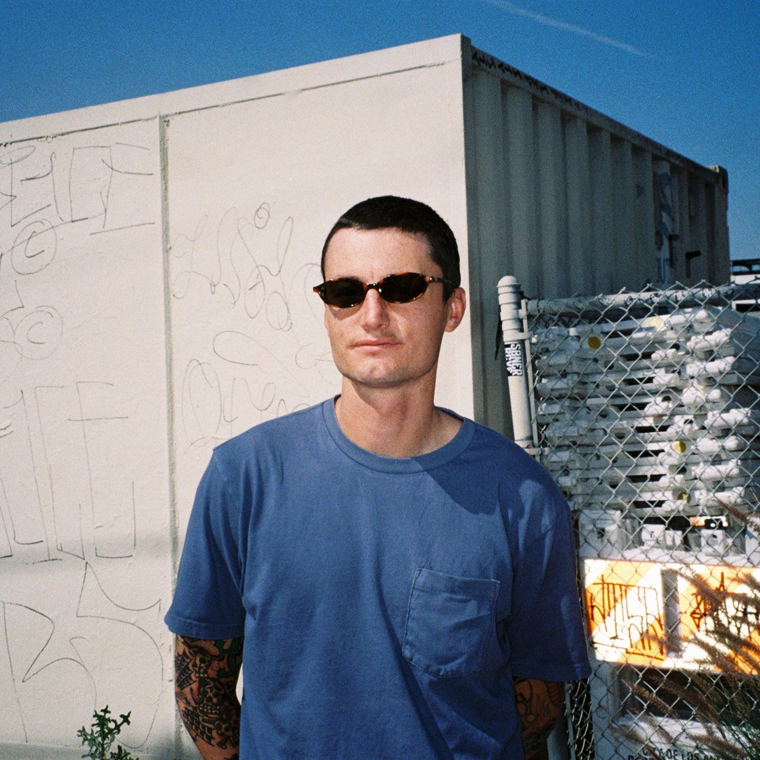 Zachary Kovacs wearing SAD Eyewear Celeste oval sunglasses in tortoise with polarized olive UV protection lenses