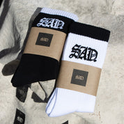black and white sad socks