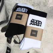 black and white sad socks 