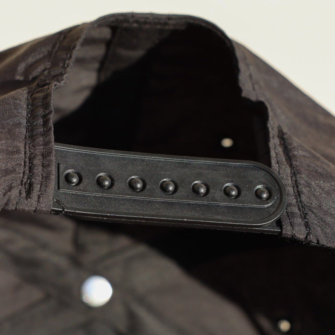 Sad Eyewear black embroidered Hat snapback close up 